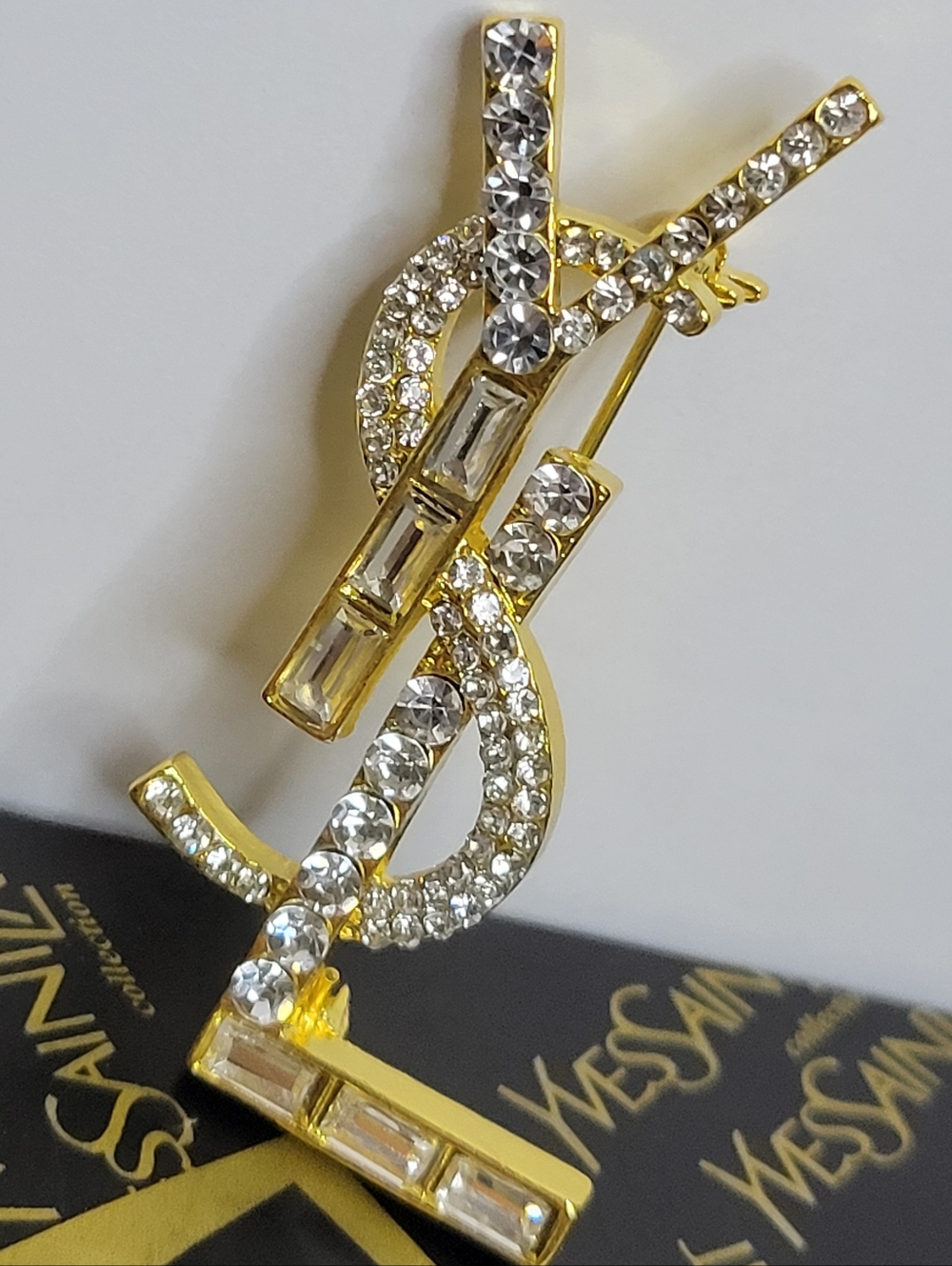 Yves Saint Laurent Gold and Clear Crystal YSL Logo Brooch